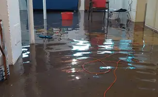 Basement with boiler, cabinets and washing machine completely flooded in Riverside, CA