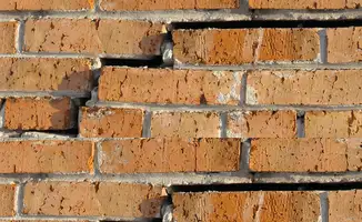 Brick wall with serious structural damage in Riverside, CA